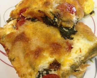 Яйца со шпинатом запеченные в кремовом соусе