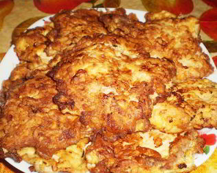 Отбивная свинина, жаренная на сковороде в кляре