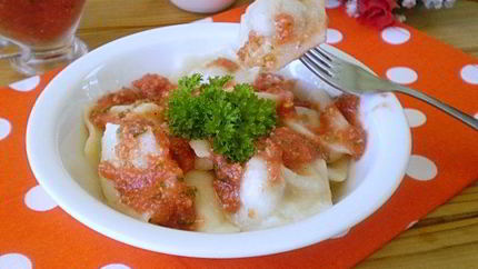 Пельмени под соусом