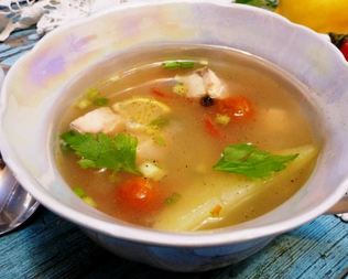 Рыбный суп с пшеном и помидорами