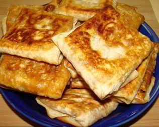 Горячая закуска в лаваше с ветчиной